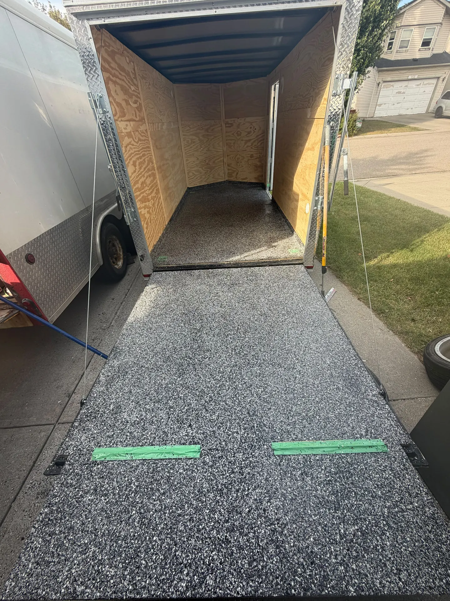 Grey flake epoxy cargo trailer floor, by Westside Mogul Resin in Calgary