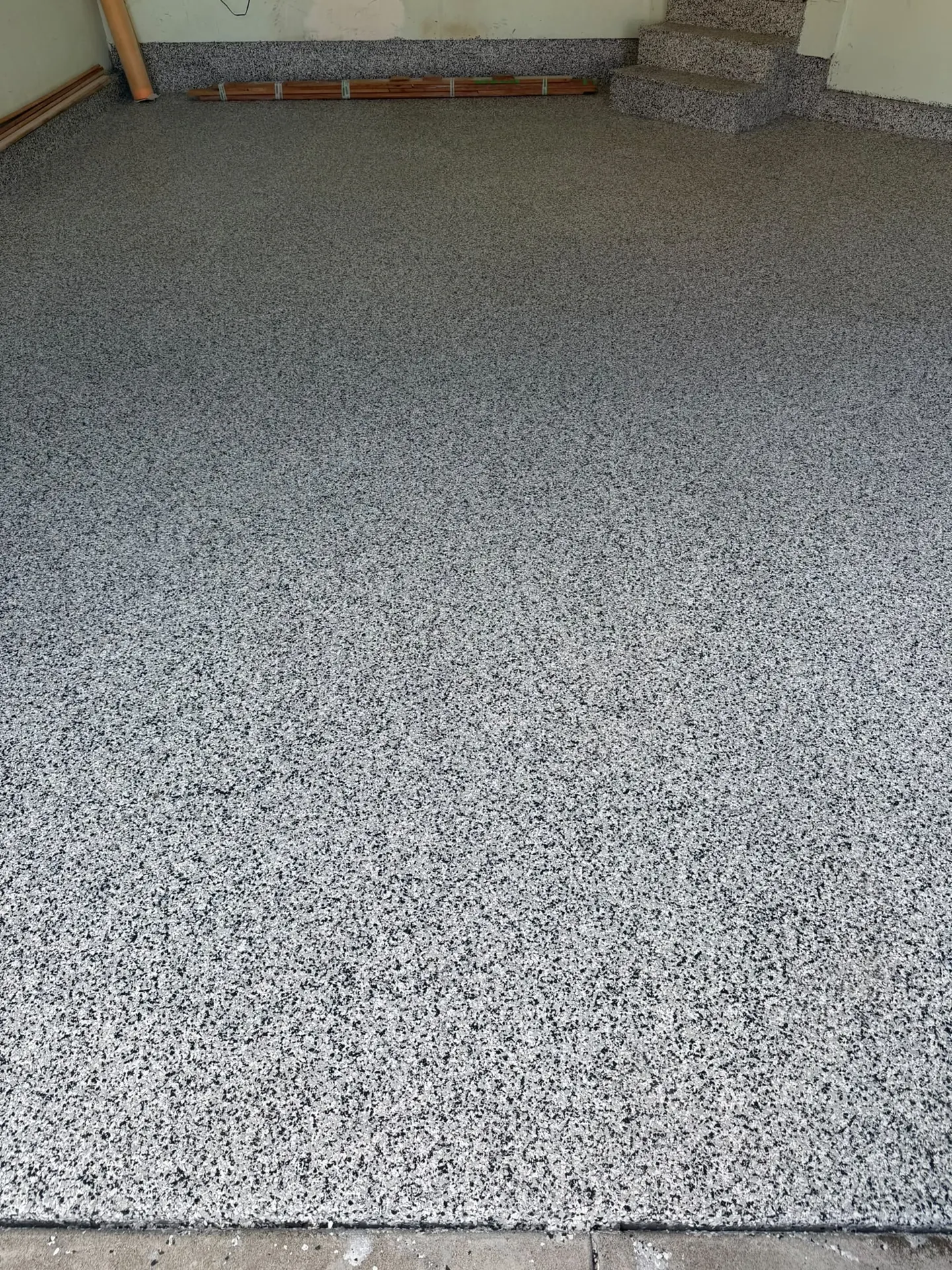 Close-up of flake epoxy floor texture, by Westside Mogul Resin in Calgary