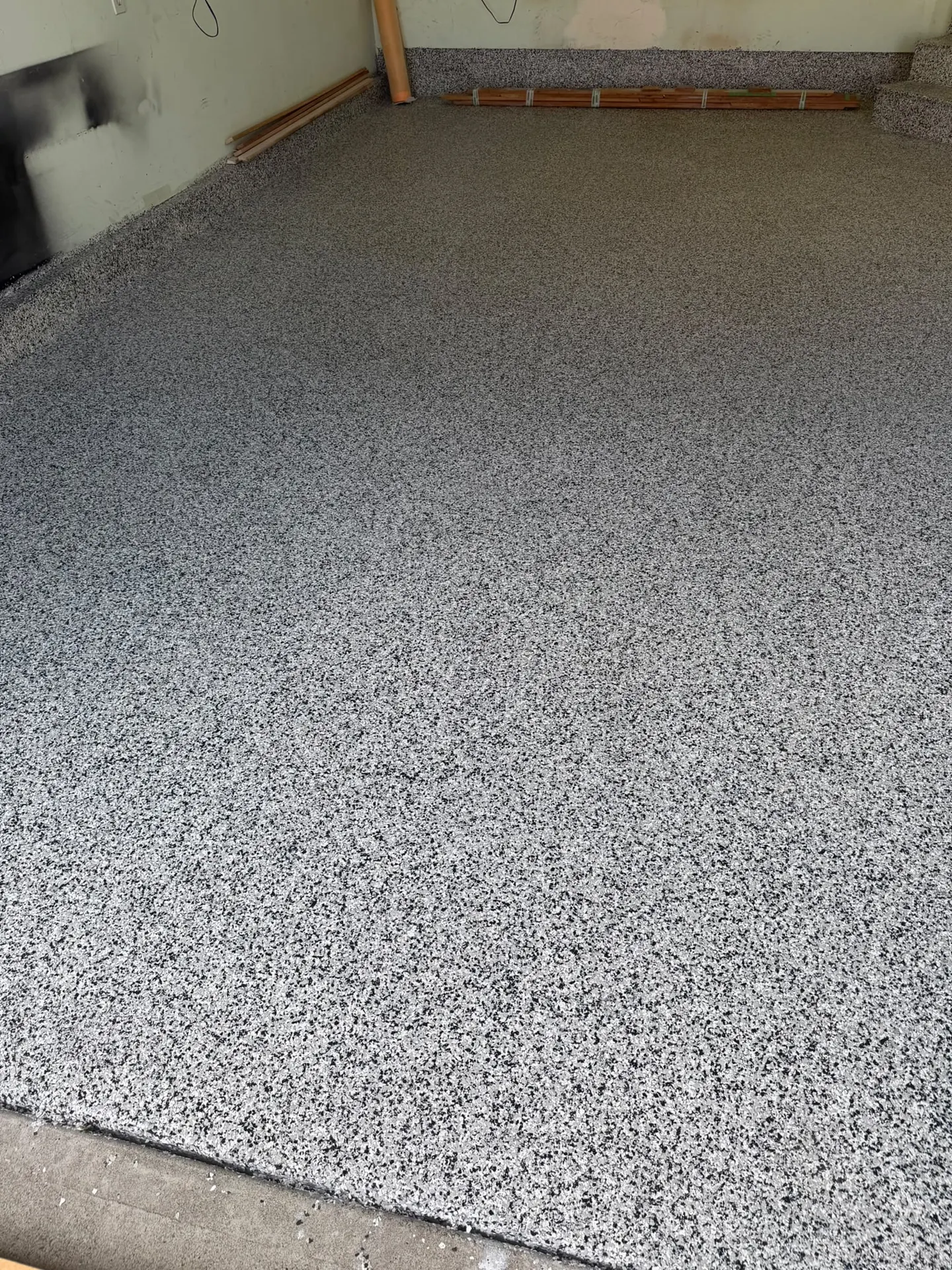 Close-up of flake epoxy floor texture, by Westside Mogul Resin in Calgary