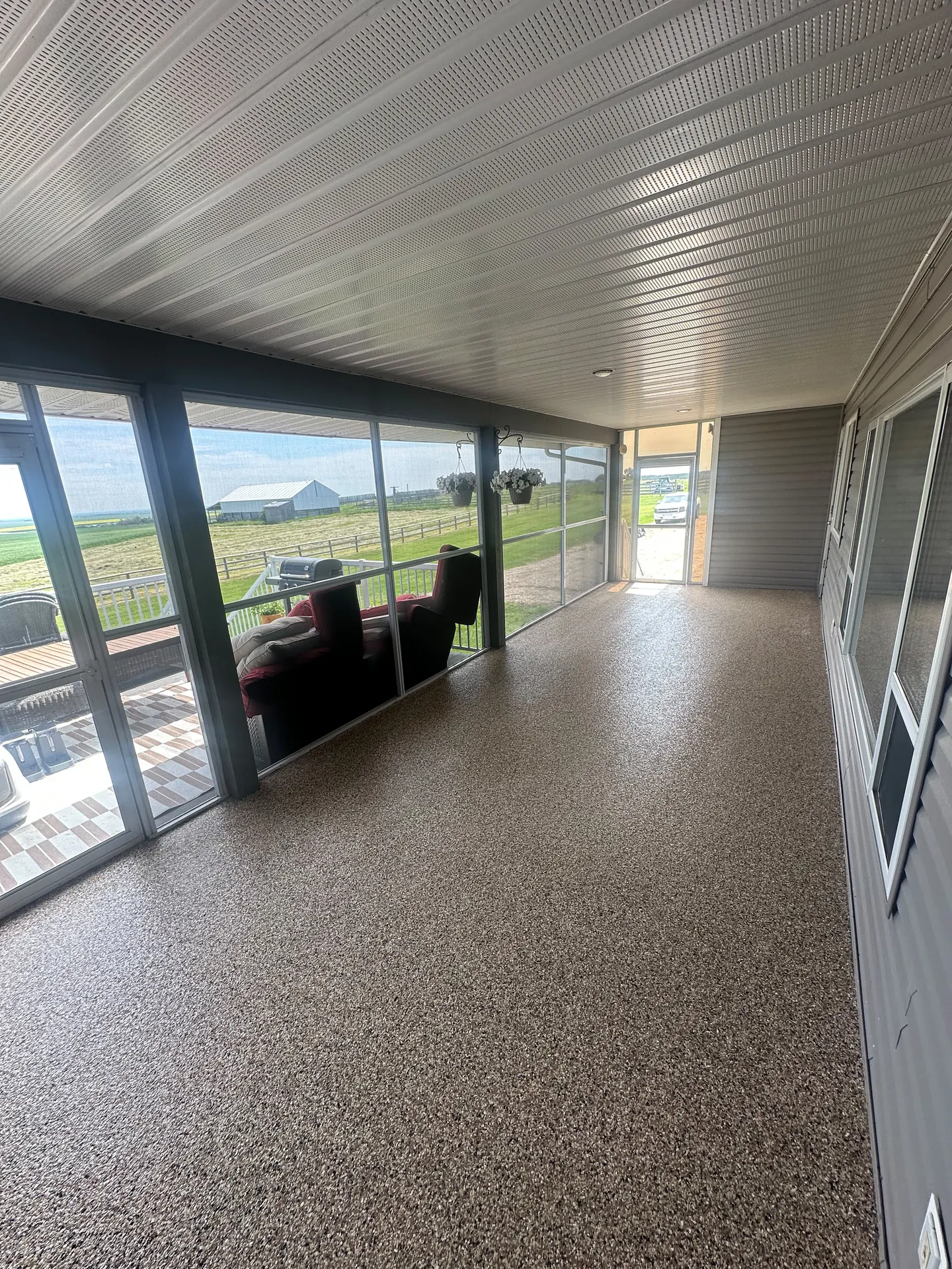 Flake epoxy sunroom patio floor, by Westside Mogul Resin in Calgary