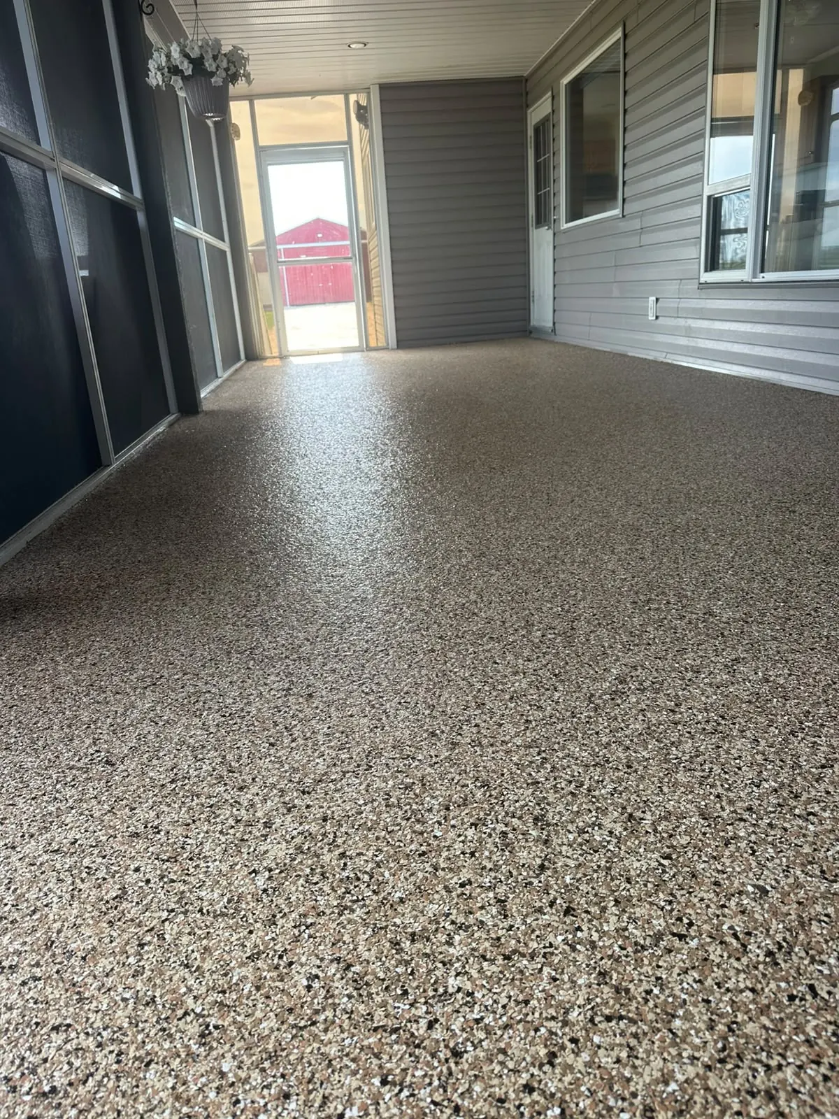 Flake epoxy sunroom patio floor, by Westside Mogul Resin in Calgary