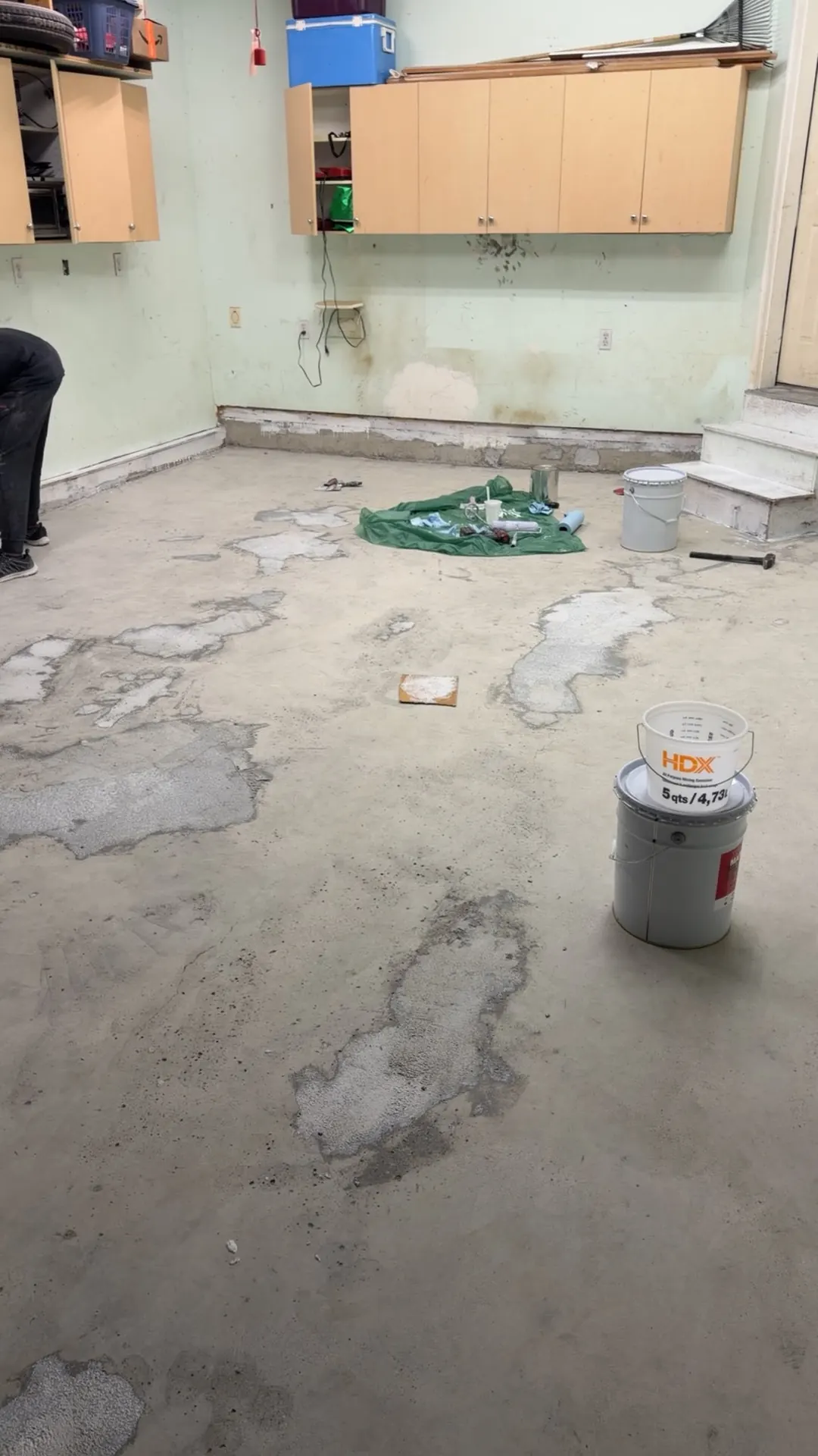Damaged garage concrete before repair and epoxy, by Westside Mogul Resin in Calgary