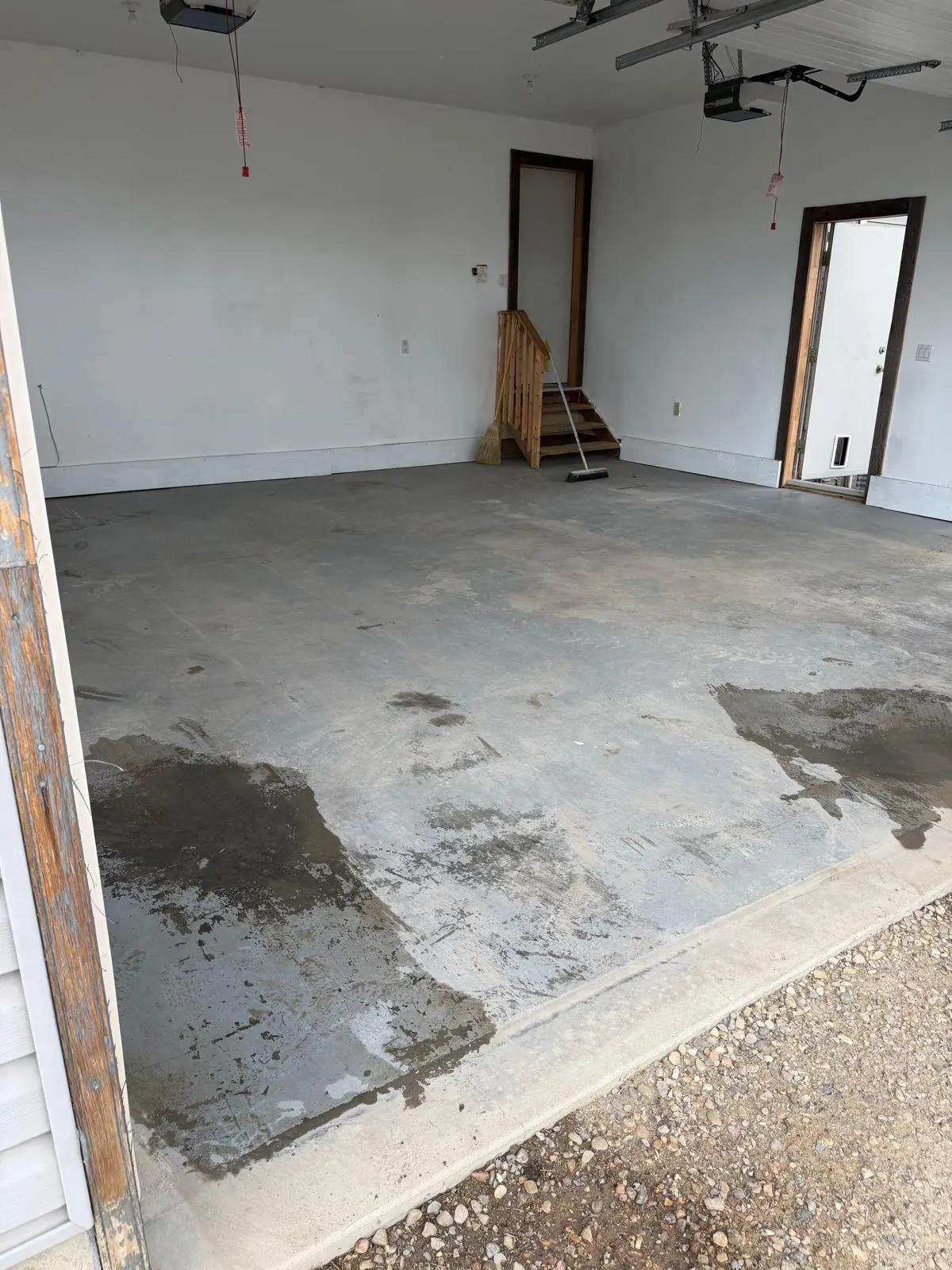 Stained garage concrete before epoxy, by Westside Mogul Resin in Calgary