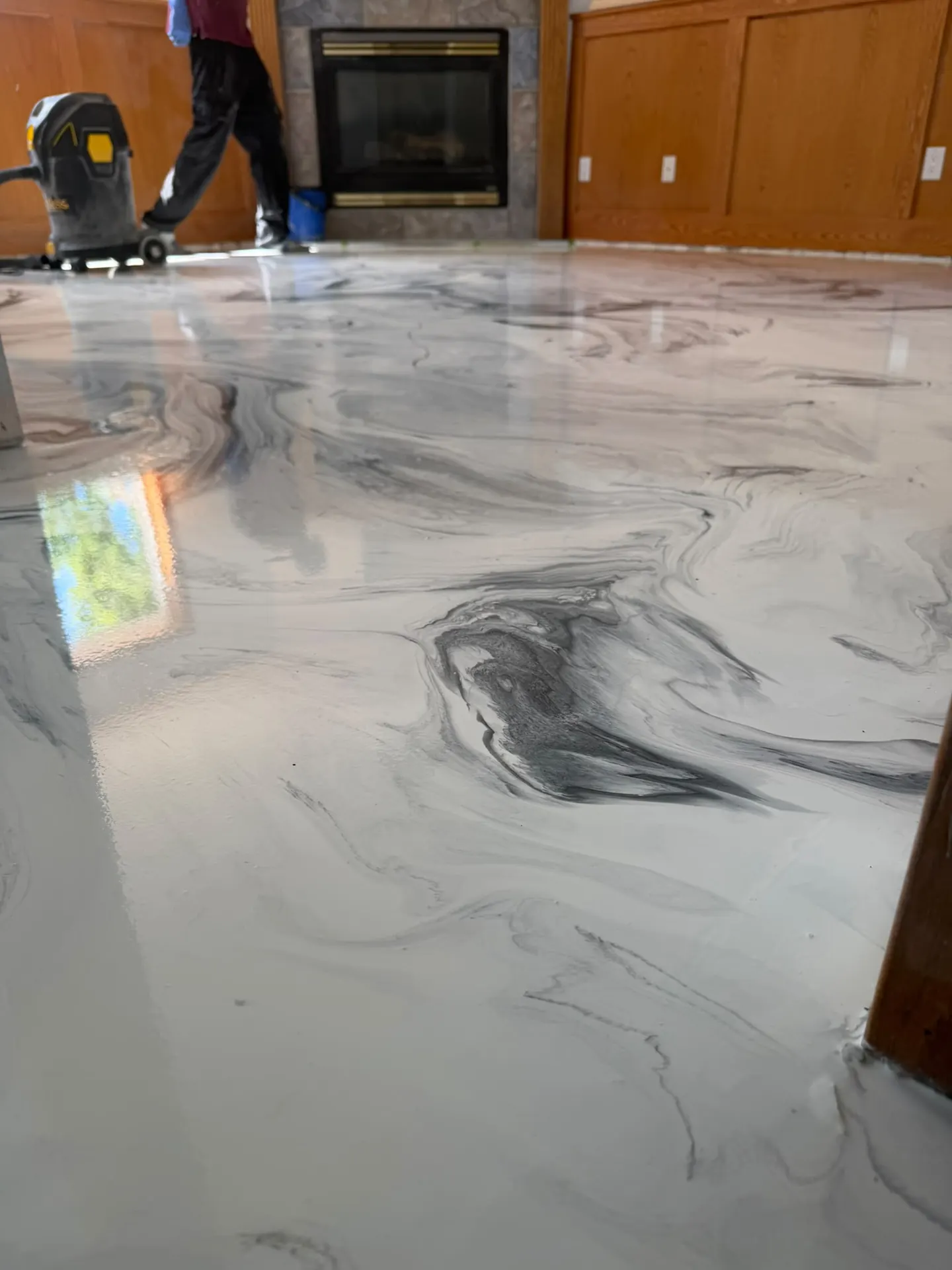 White marble metallic epoxy floor by Westside Mogul Resin in Calgary