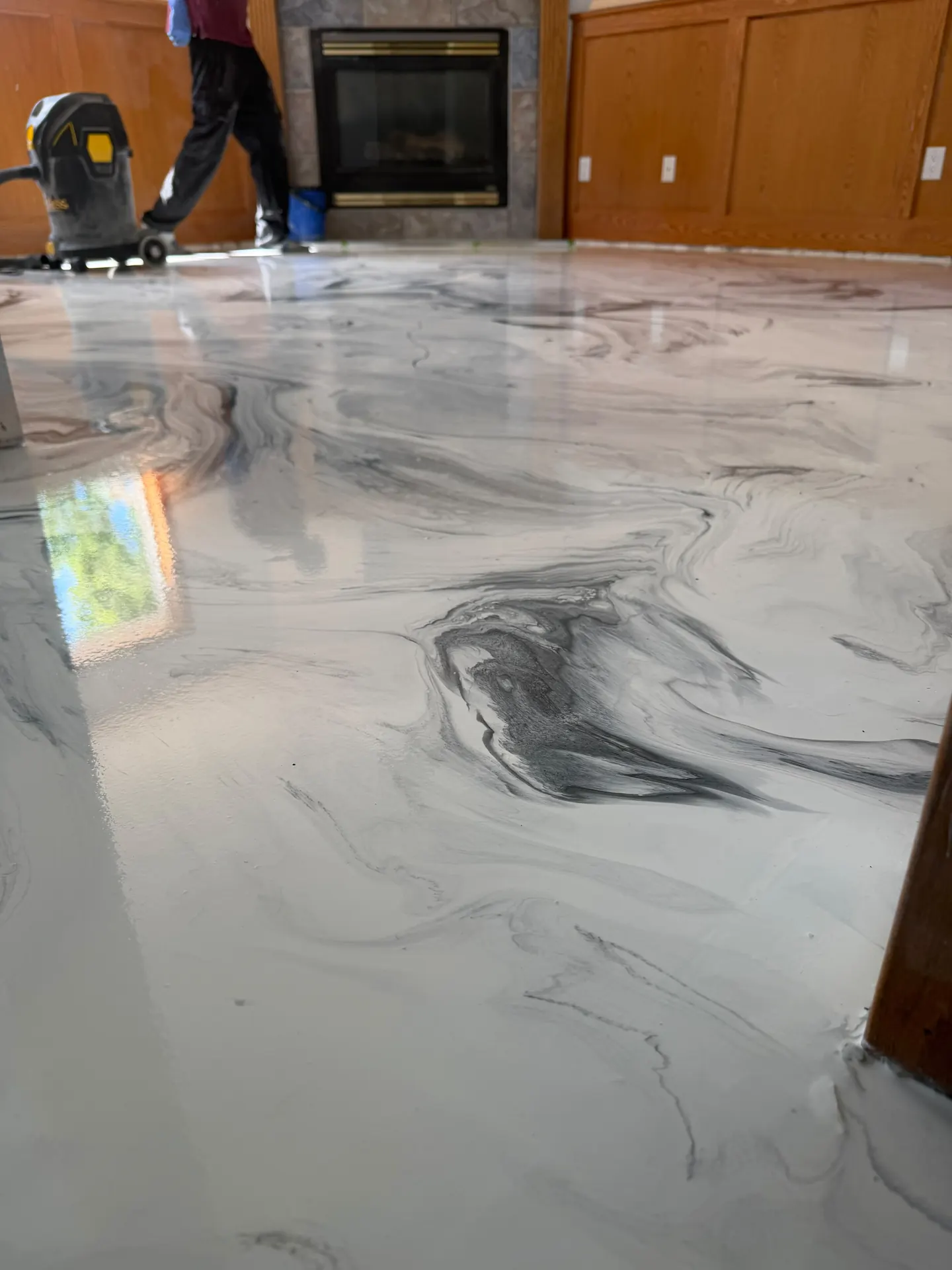 Marble metallic epoxy floor being ground and polished, by Westside Mogul Resin in Calgary
